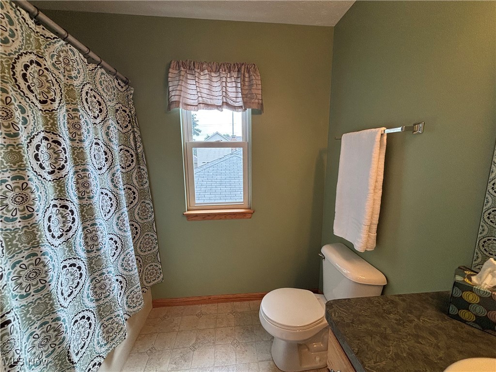 30895 Harrison Road Wickliffe, OH 44092 - Photo 19 of 23 Second floor guest bath with tub and shower