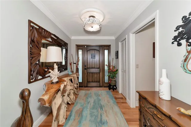 a view of a livingroom with furniture and a window