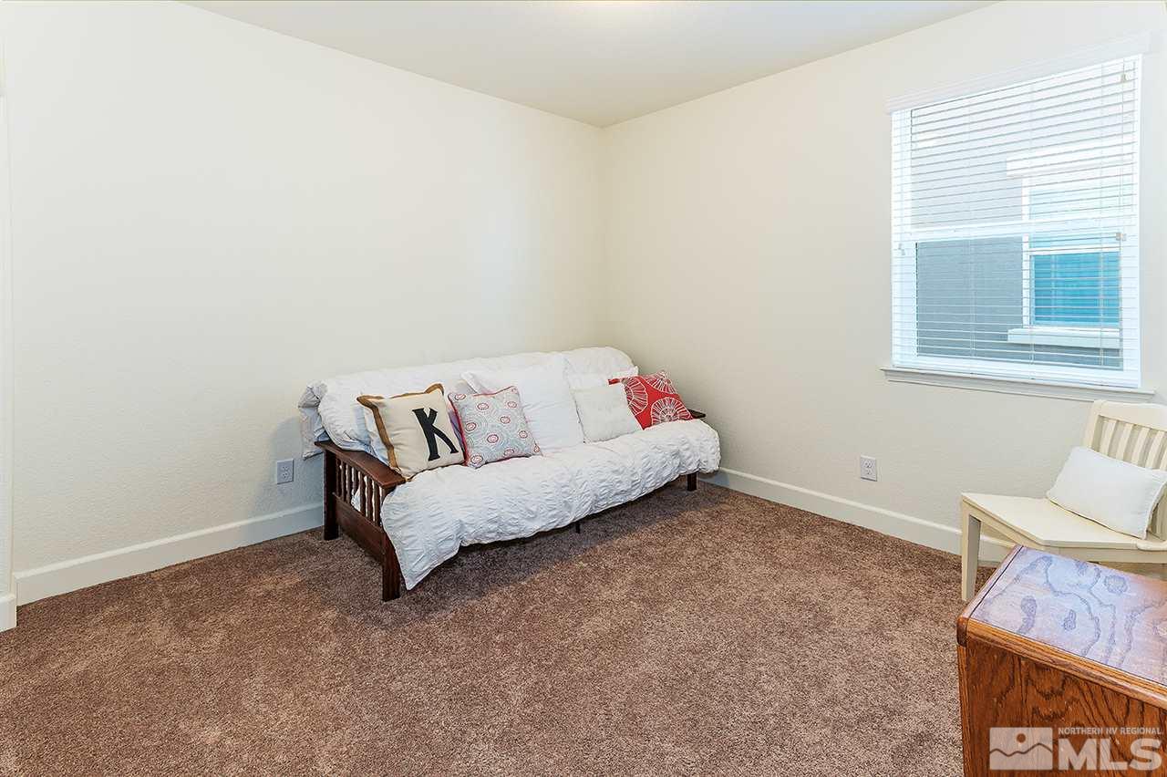 10350 Culiacan Pass Trail Reno, NV 89521 - Photo 11 of 20 a living room with furniture and a window
