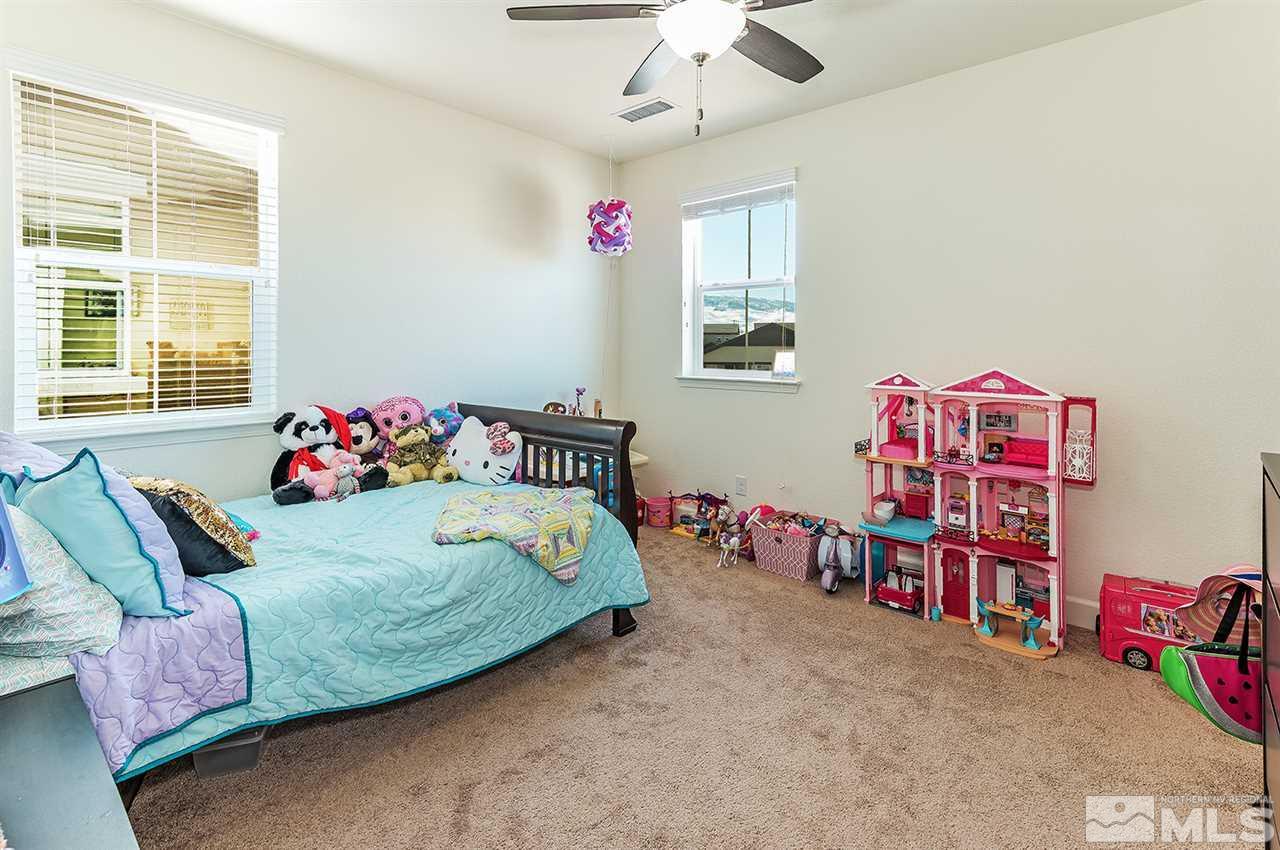 10350 Culiacan Pass Trail Reno, NV 89521 - Photo 12 of 20 a bedroom with bed and a window