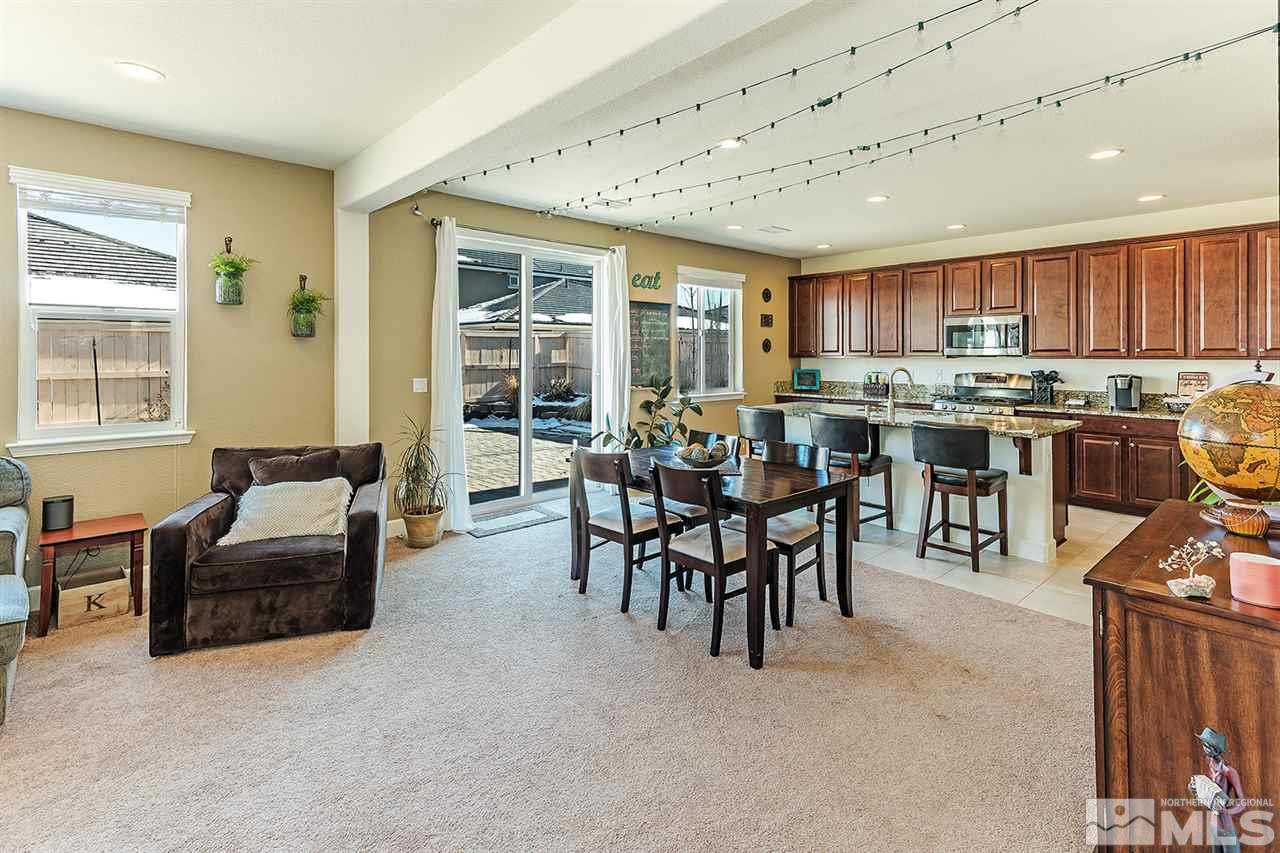 10350 Culiacan Pass Trail Reno, NV 89521 - Photo 4 of 20 a view of a dining room with furniture window and outside view