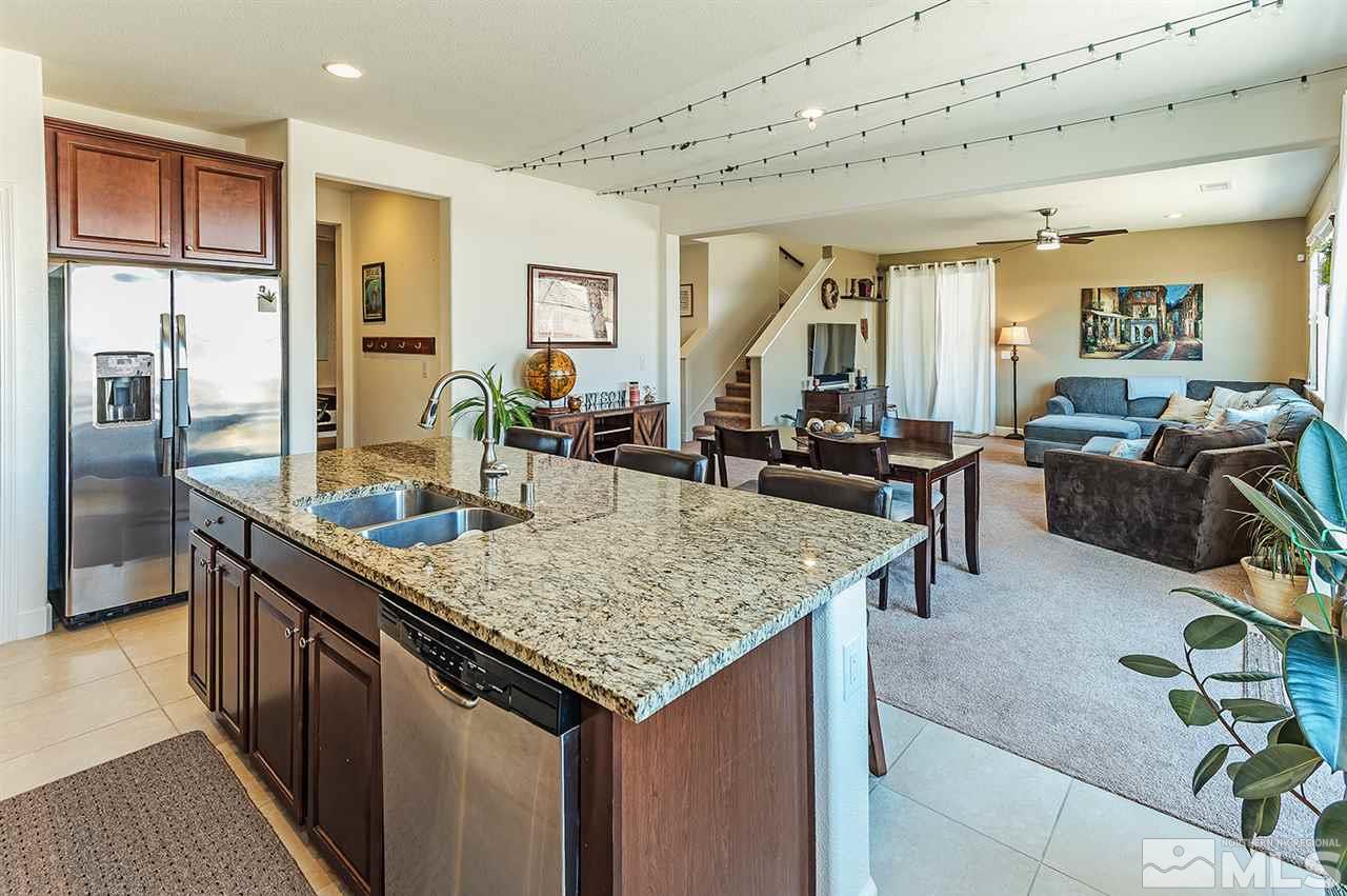 10350 Culiacan Pass Trail Reno, NV 89521 - Photo 7 of 20 a kitchen with granite countertop lots of counter top space