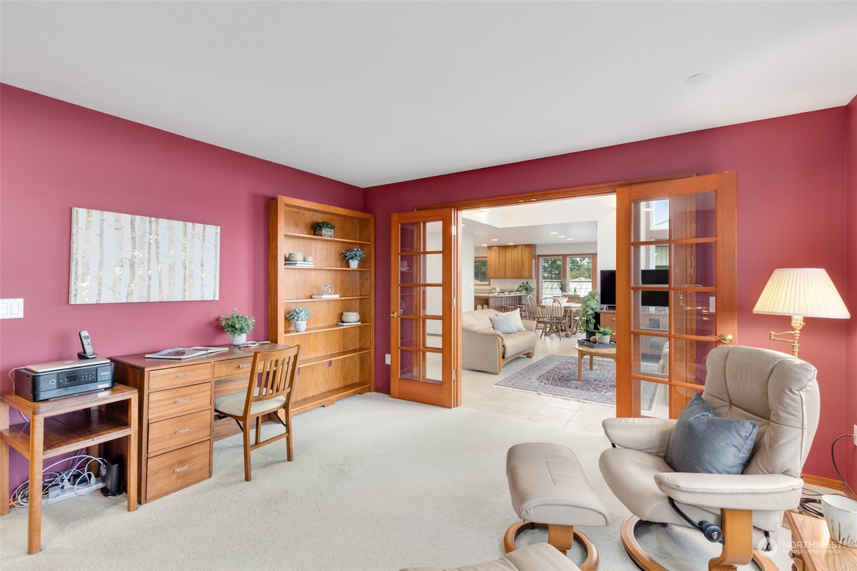 9942 Johnson Point Road Northeast Olympia, WA 98516 - Photo 12 of 34 a living room with furniture and a wooden floor