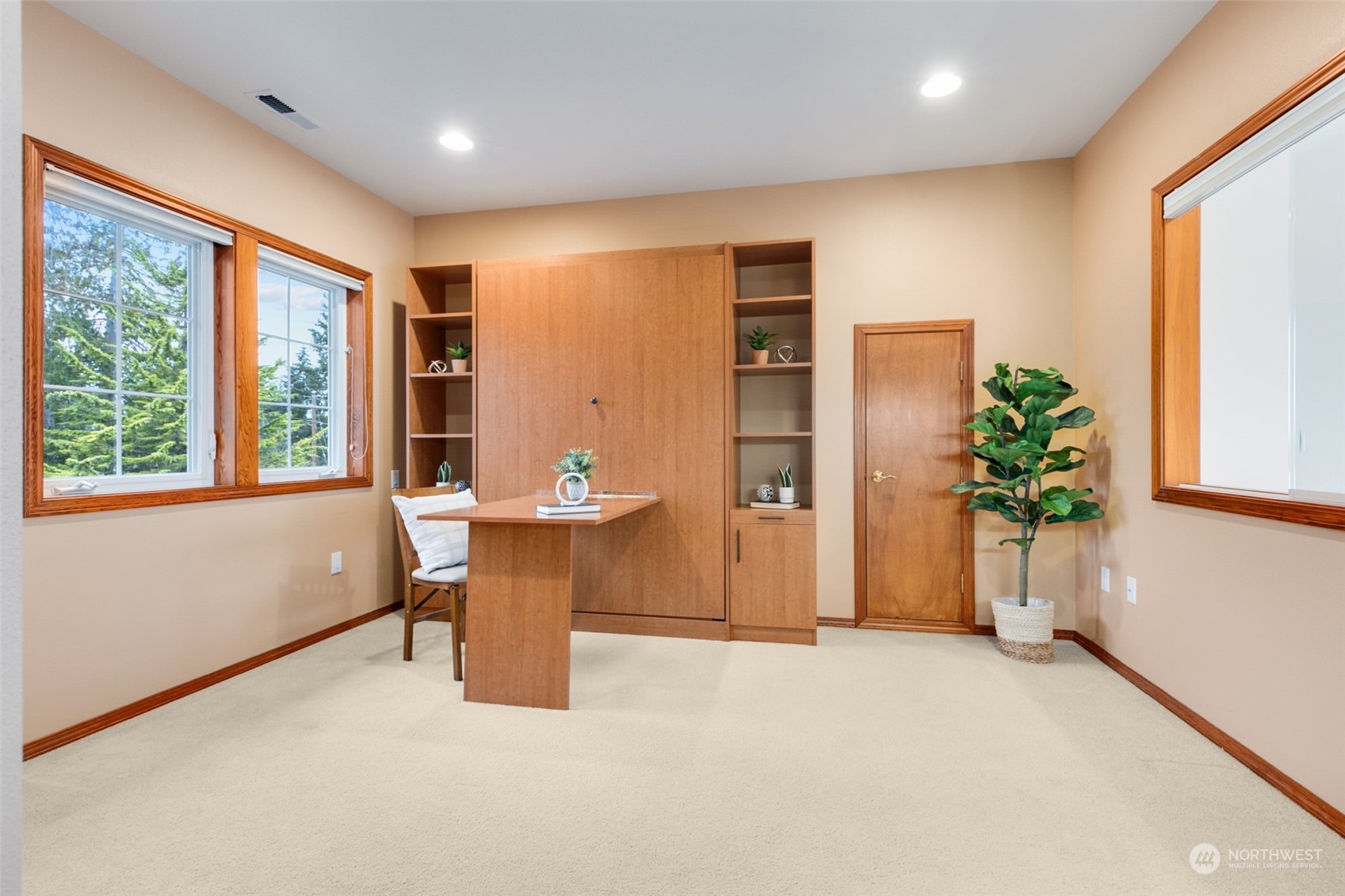 9942 Johnson Point Road Northeast Olympia, WA 98516 - Photo 23 of 34 a view of a livingroom with furniture and a window