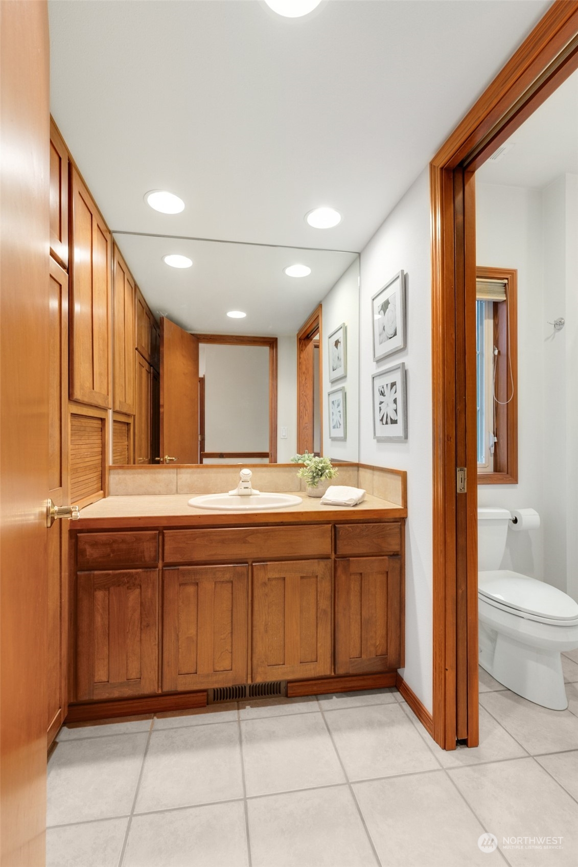 9942 Johnson Point Road Northeast Olympia, WA 98516 - Photo 24 of 34 a large bathroom with a large tub shower and sink