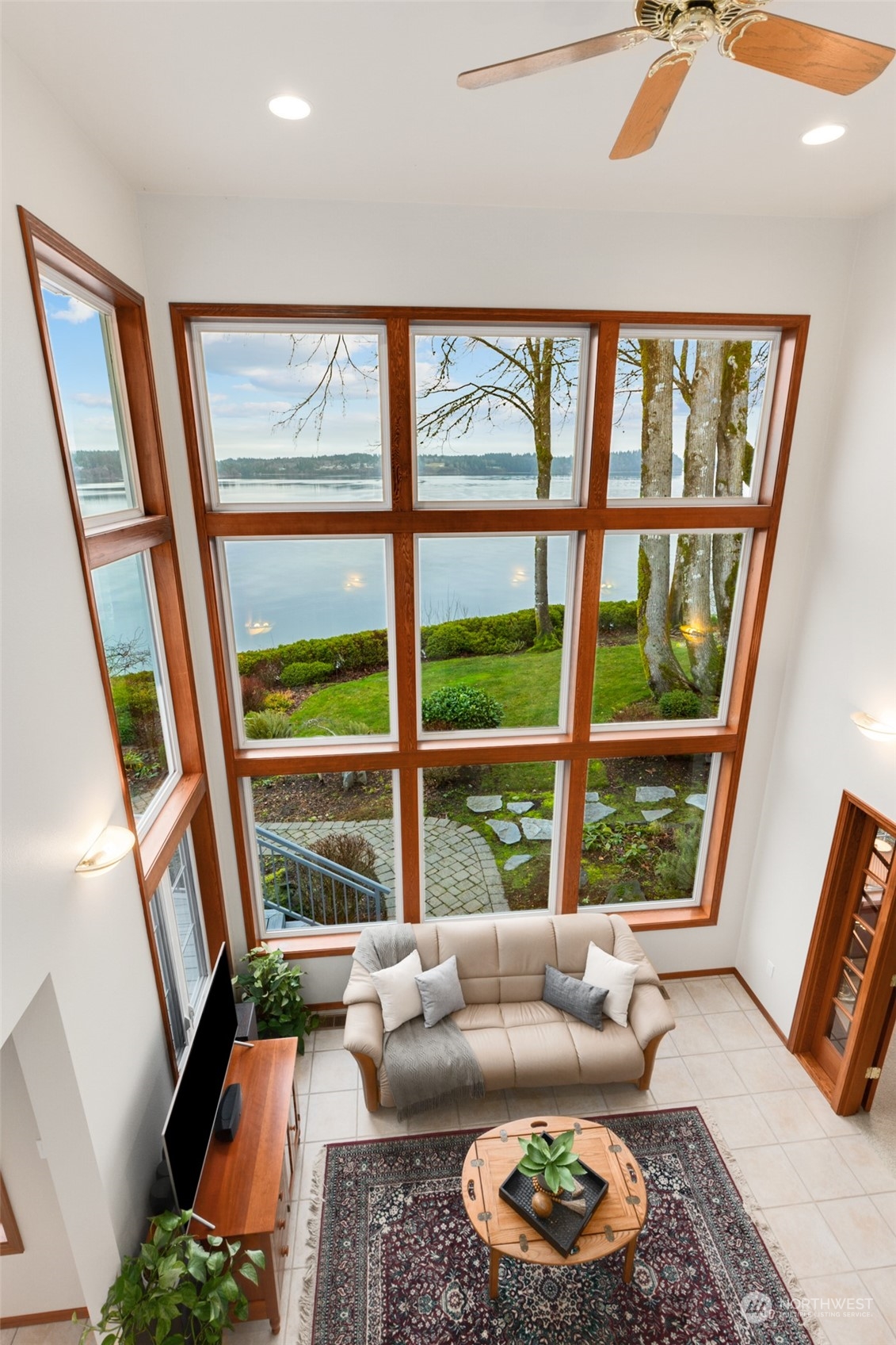 9942 Johnson Point Road Northeast Olympia, WA 98516 - Photo 26 of 34 a living room with furniture and a large window