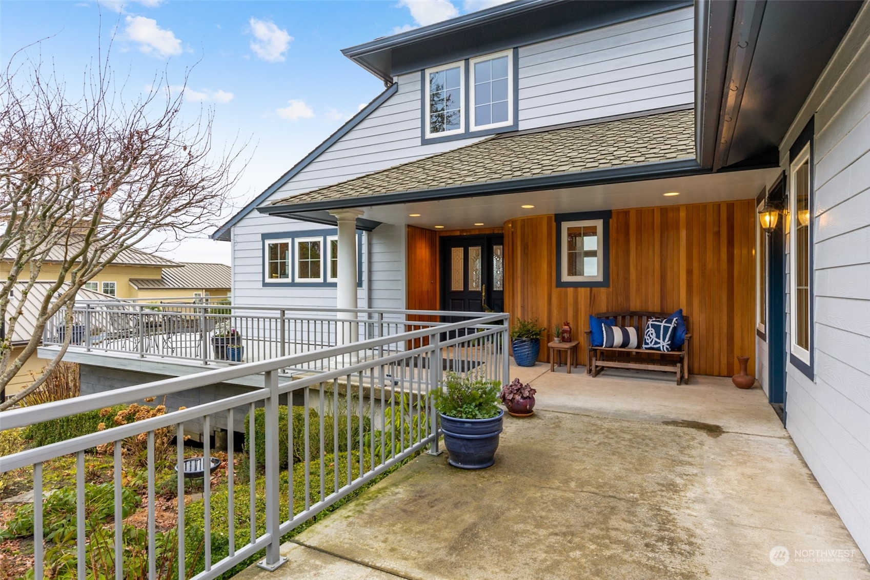 9942 Johnson Point Road Northeast Olympia, WA 98516 - Photo 27 of 34 a view of a house with backyard and sitting area