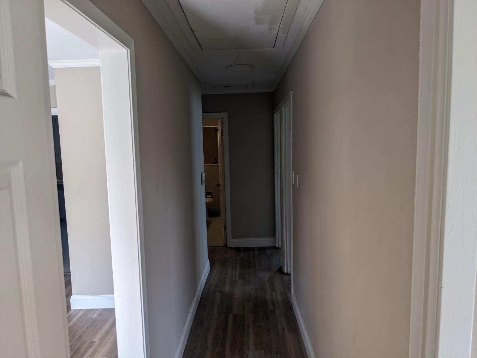 3470 Kipling Drive Beaumont, TX 77706 - Photo 11 of 21 a view of a hallway with wooden floor
