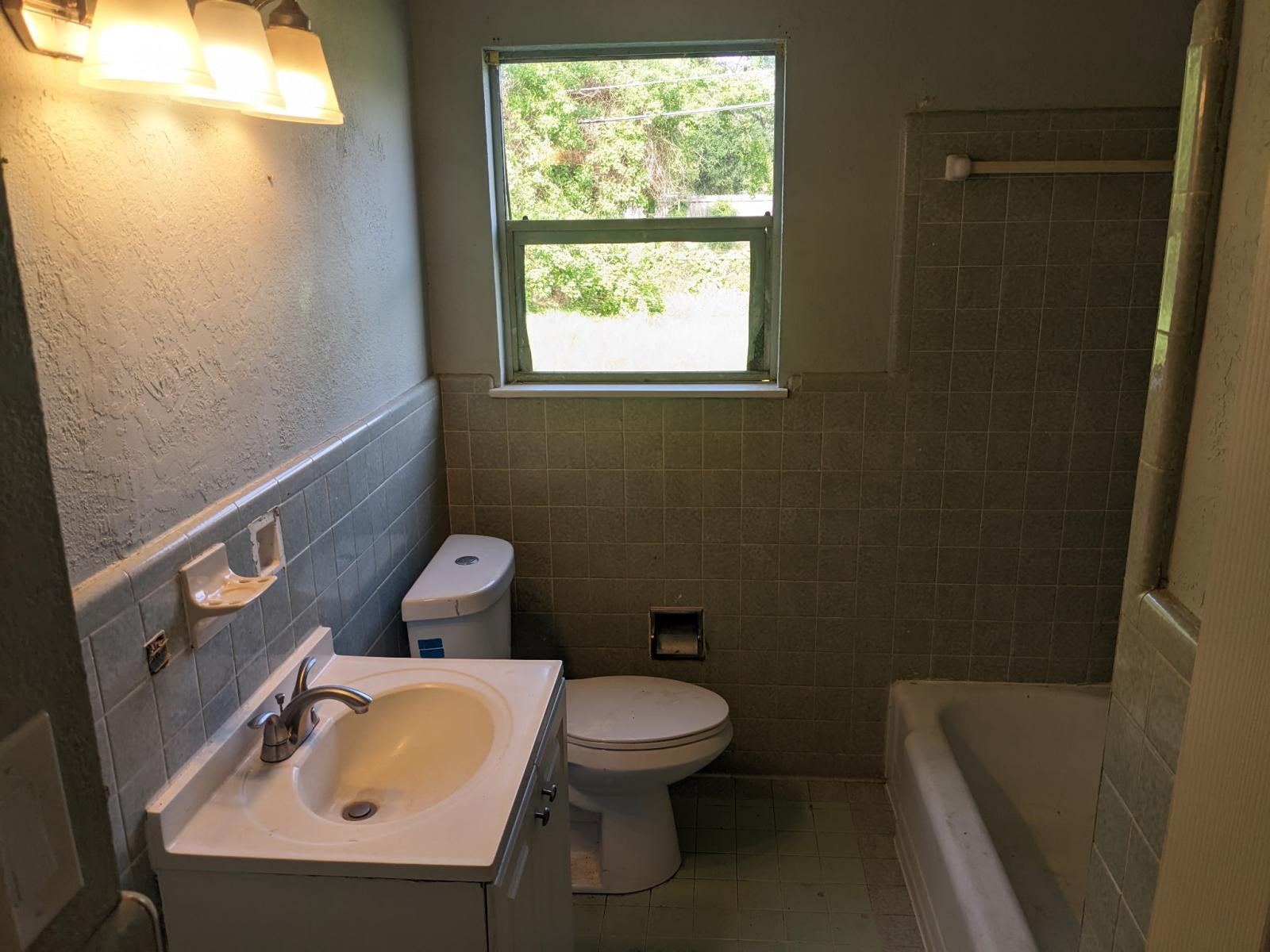3470 Kipling Drive Beaumont, TX 77706 - Photo 9 of 21 a bathroom with a sink and a toilet