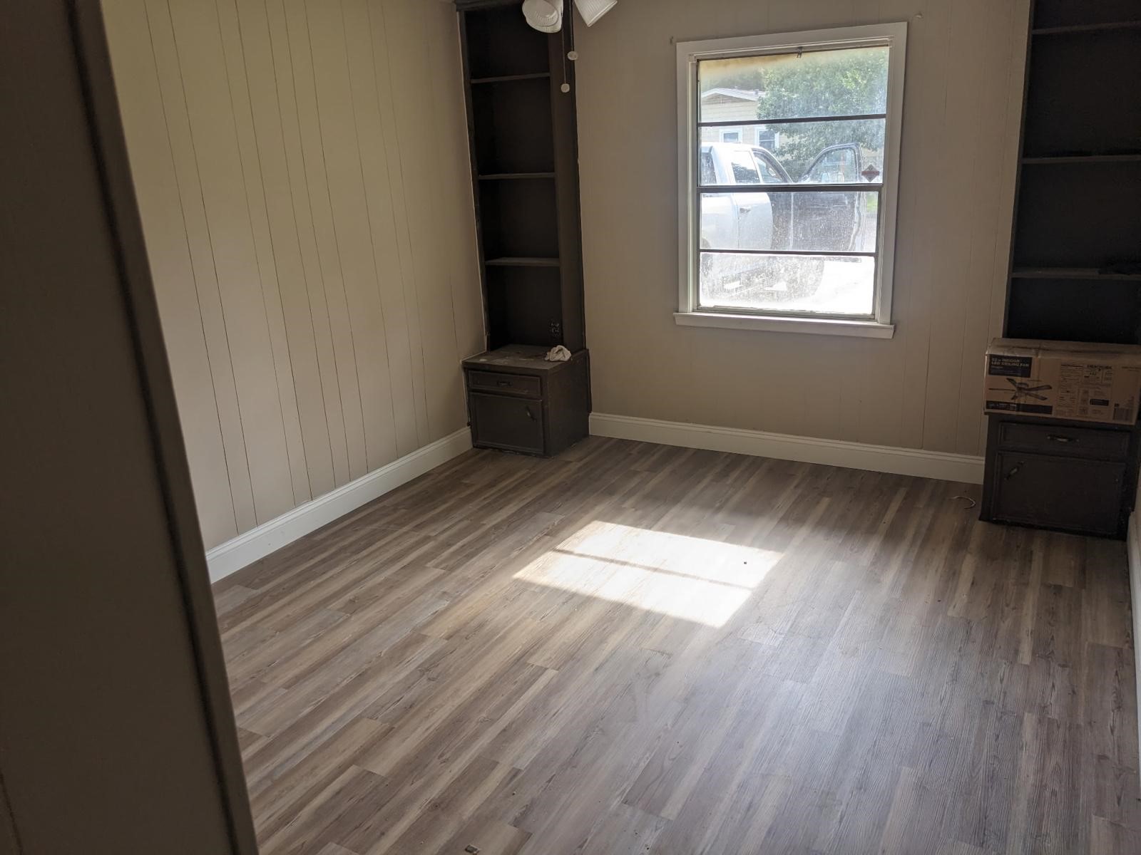 3470 Kipling Drive Beaumont, TX 77706 - Photo 10 of 21 an empty room with wooden floor and windows