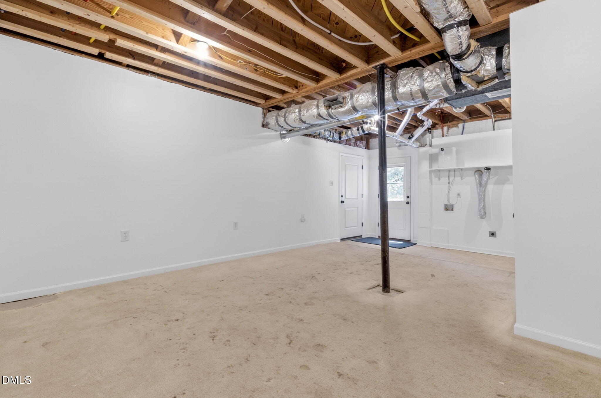 1224 Pineview Drive Raleigh, NC 27606 - Photo 26 of 45 a view of a room with racks on the wall