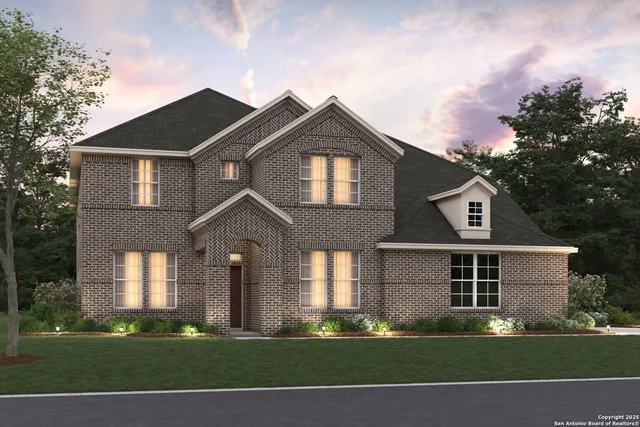 an aerial view of a house with yard swimming pool and outdoor seating