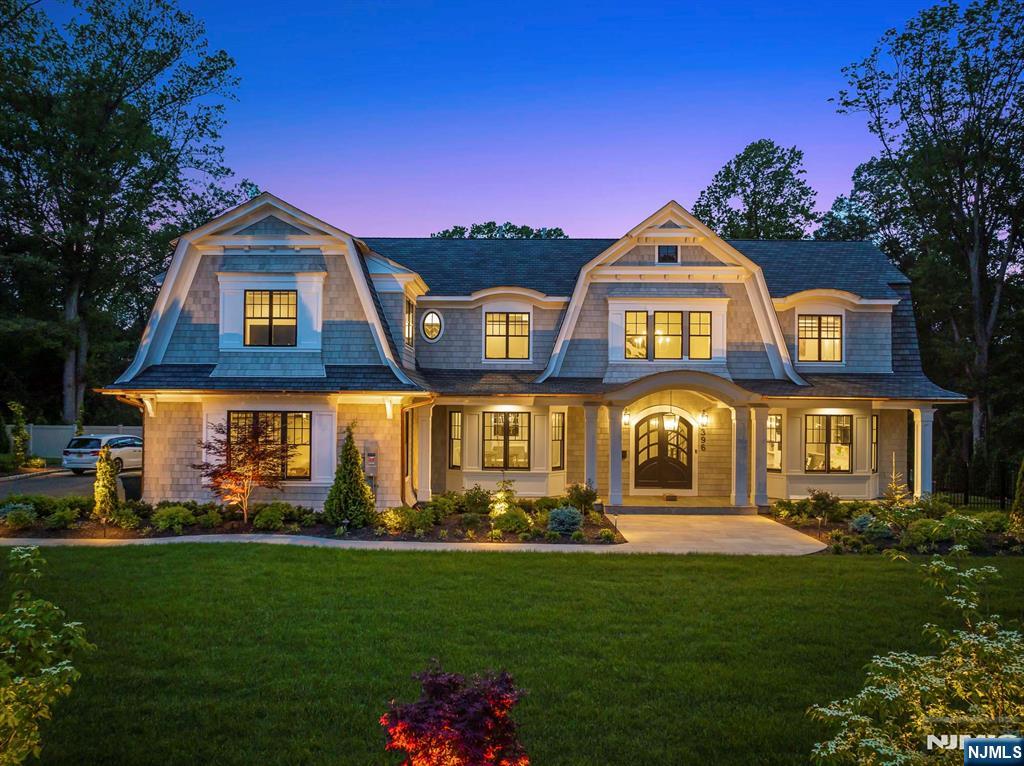 396 Knollwood Road Ridgewood, NJ 07450 - Photo 1 of 50 a front view of a house with a yard