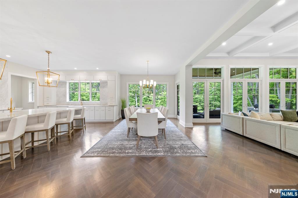 396 Knollwood Road Ridgewood, NJ 07450 - Photo 14 of 50 a living room with furniture large window and wooden floor