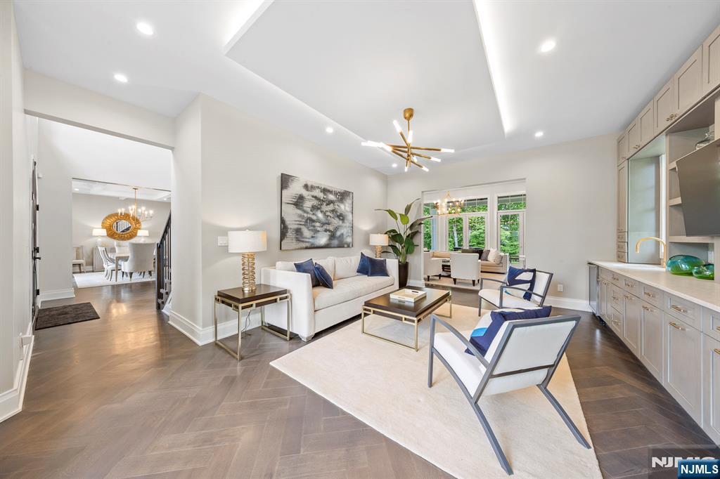396 Knollwood Road Ridgewood, NJ 07450 - Photo 19 of 50 a living room with furniture and a table