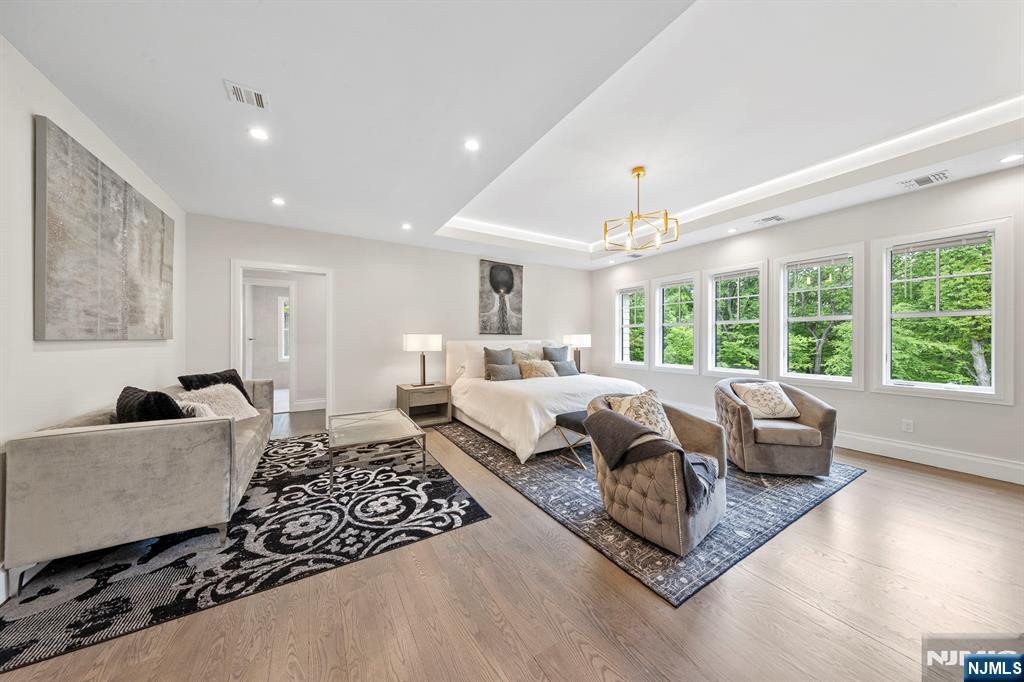 396 Knollwood Road Ridgewood, NJ 07450 - Photo 34 of 50 a living room with furniture and a large window