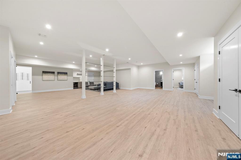 396 Knollwood Road Ridgewood, NJ 07450 - Photo 44 of 50 a view of a kitchen with a refrigerator and a kitchen counter top