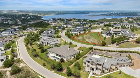 an aerial view of a swimming pool with outdoor space