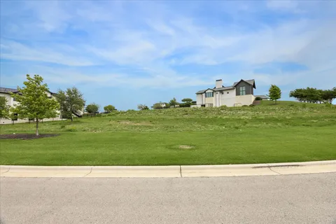 a view of a grassy field with grassy field