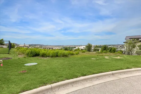 an aerial view of a house with yard swimming pool and outdoor seating