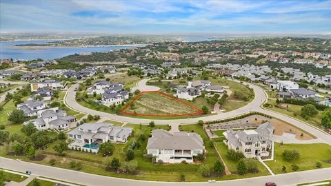 an aerial view of a residential houses with outdoor space