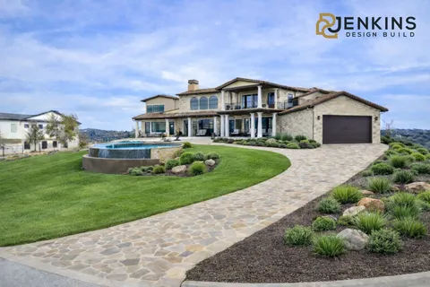 a view of a patio with swimming pool