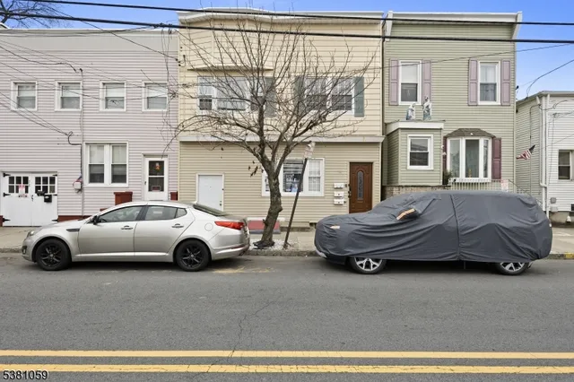 a car parked in front of a house