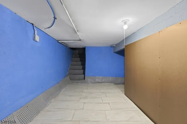 a kitchen with a sink stove and microwave