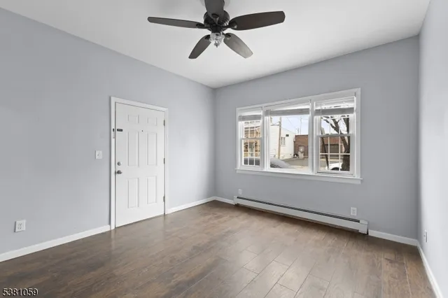 a kitchen with stainless steel appliances granite countertop a refrigerator sink and microwave