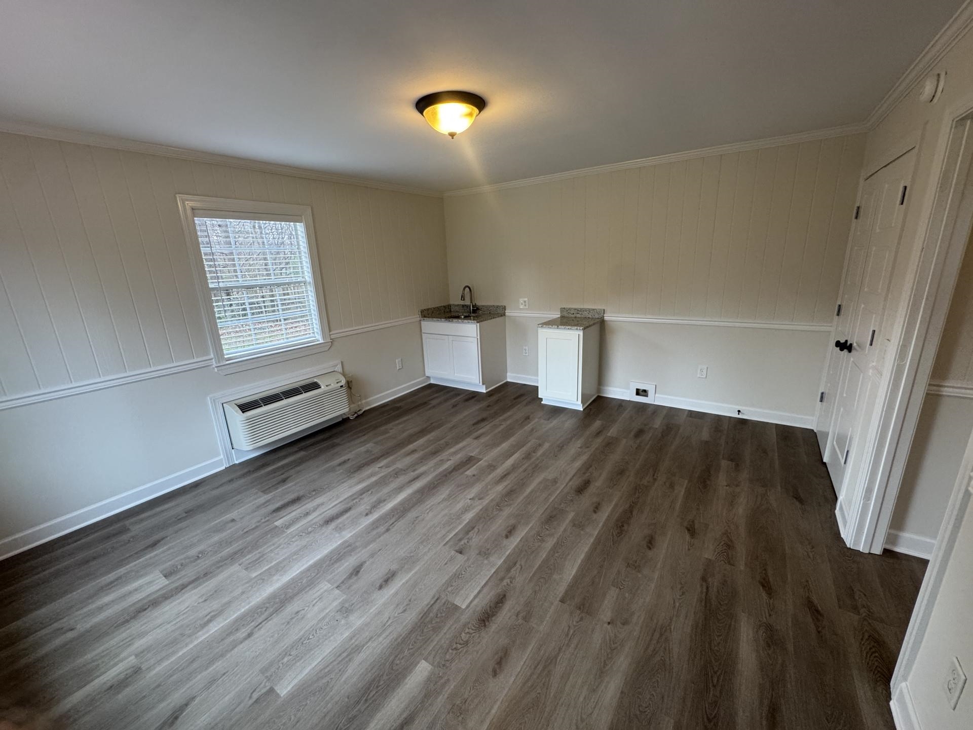 2823 Elmore Park Road Bartlett, TN 38134 - Photo 19 of 22 Interior space with dark wood-style floors and crown molding