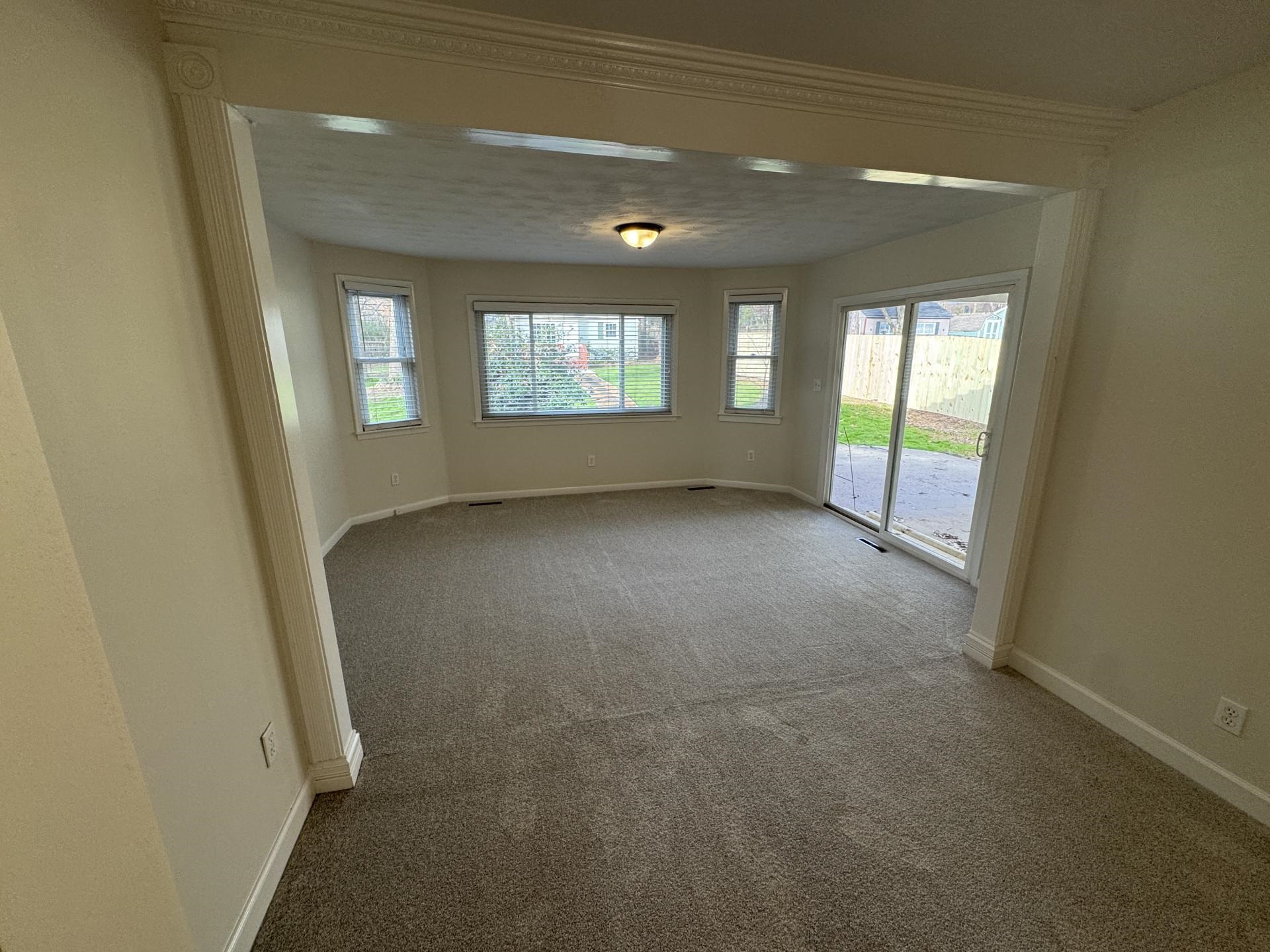 2823 Elmore Park Road Bartlett, TN 38134 - Photo 6 of 22 Carpeted spare room featuring baseboards