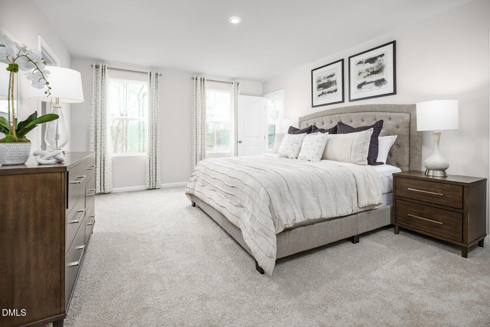 128 Cavalier Rider Run Wendell, NC 27591 - Photo 9 of 21 a spacious bedroom with a bed and a couch
