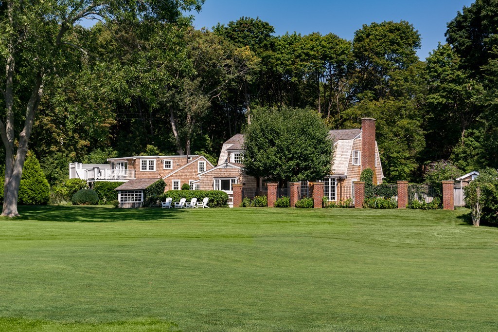95 Gannett Road Scituate, MA 02066 - Photo 2 of 30 a view of a park with large trees