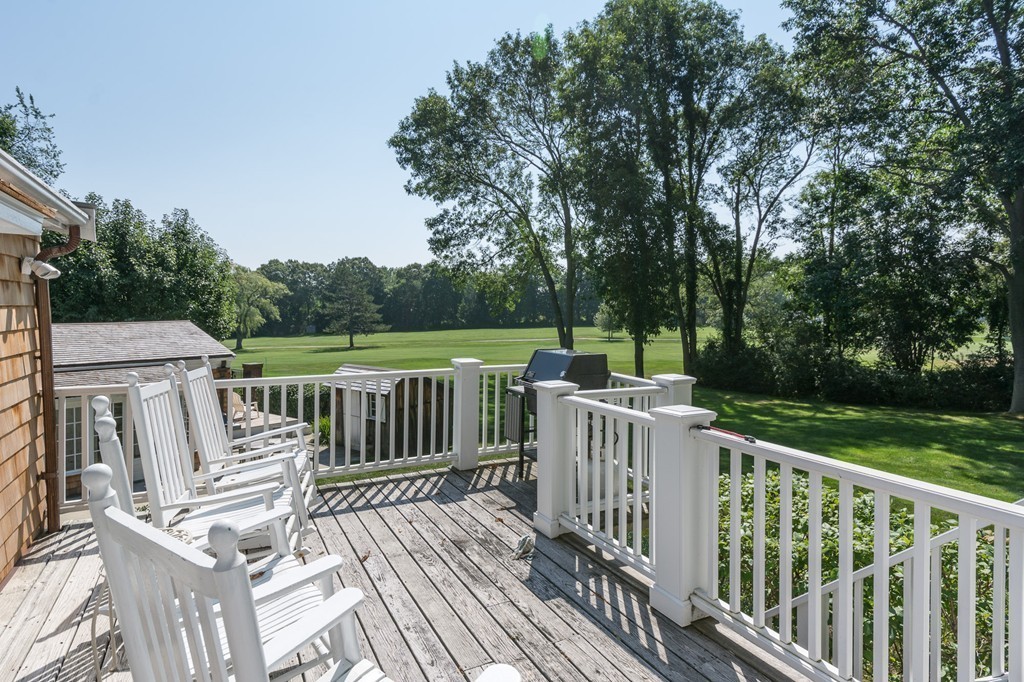 95 Gannett Road Scituate, MA 02066 - Photo 28 of 30 a view of a wooden deck and floor with trees