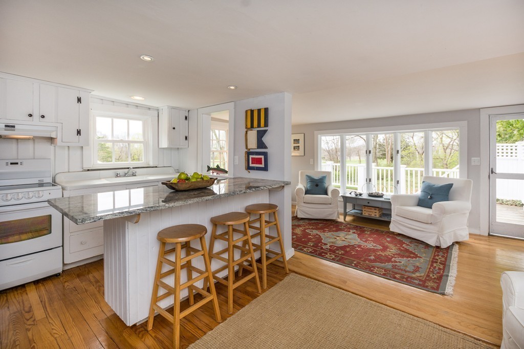 95 Gannett Road Scituate, MA 02066 - Photo 29 of 30 a living room with furniture and wooden floor