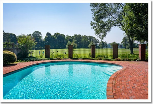 95 Gannett Road Scituate, MA 02066 - Photo 5 of 30 a view of a swimming pool with a patio and a yard