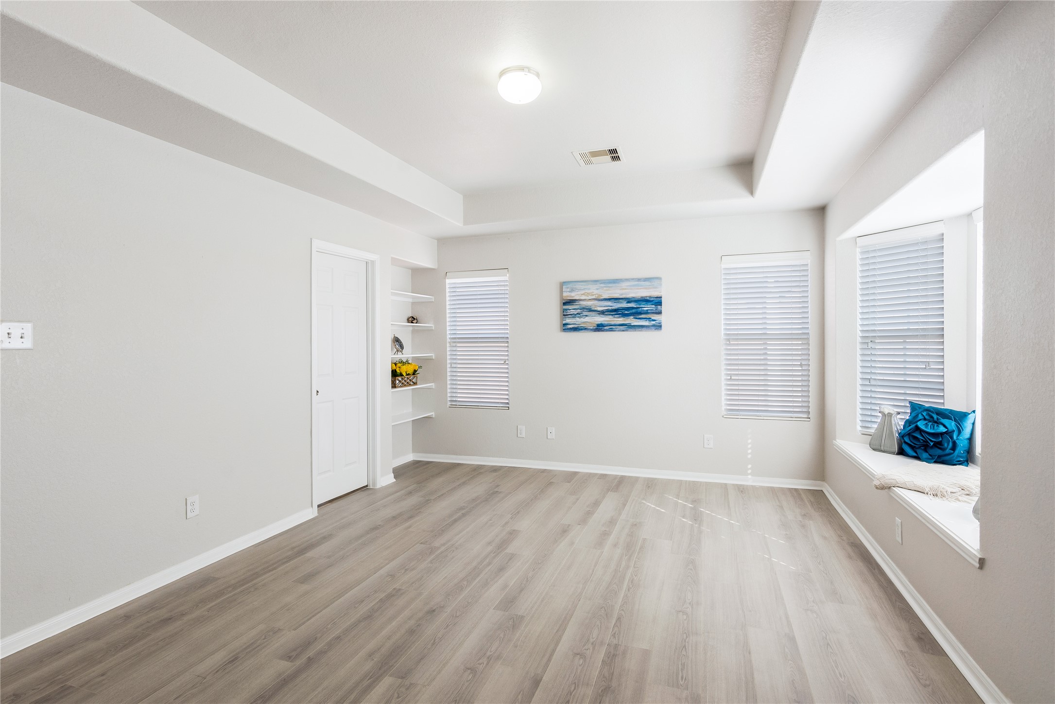 15007 Holland Grove Court Cypress, TX 77433 - Photo 16 of 28 wooden floor in an empty room with a window
