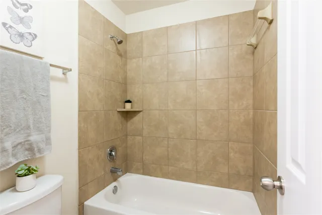 a bathroom with a sink and shower