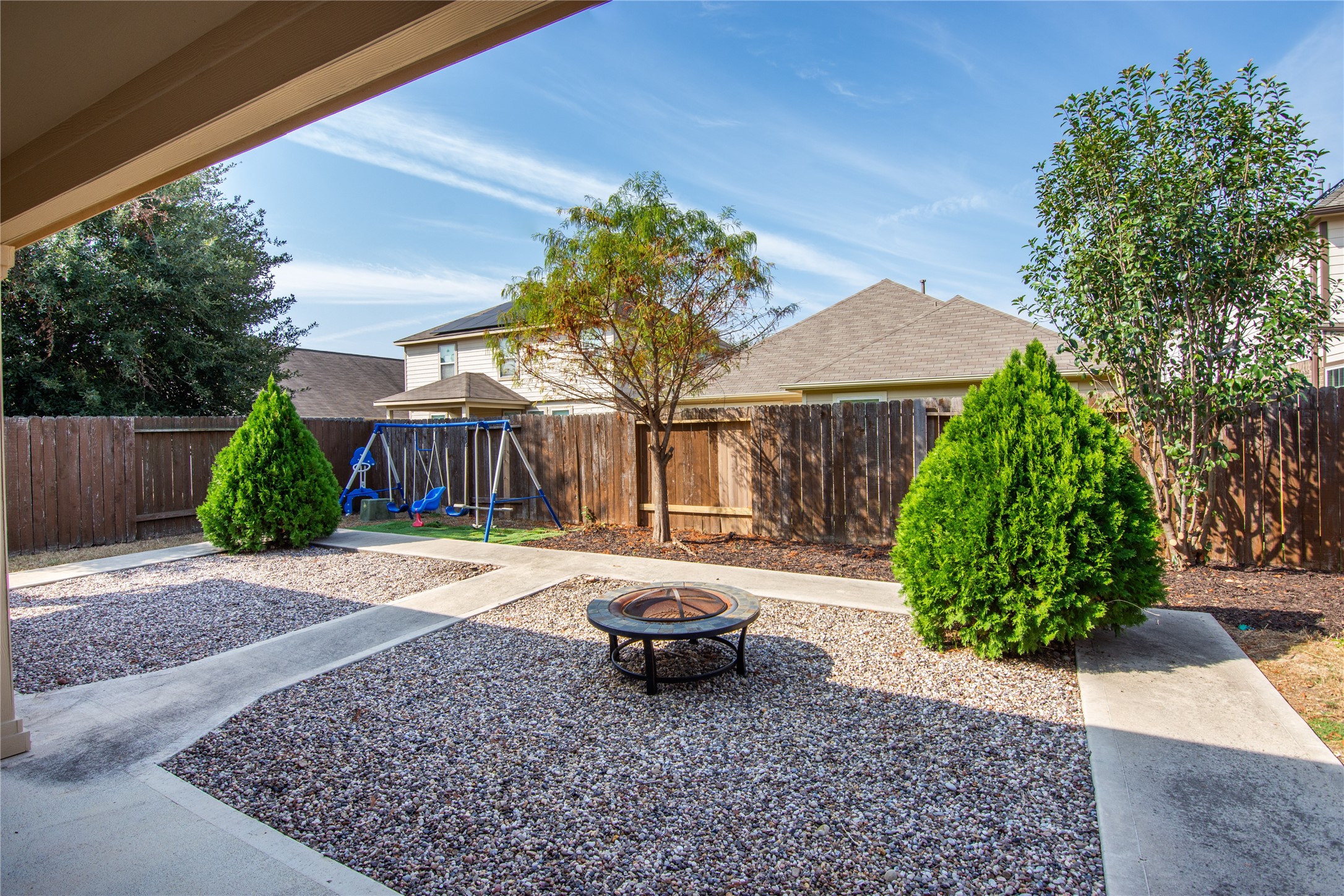 15007 Holland Grove Court Cypress, TX 77433 - Photo 28 of 28 a backyard of a house with yard and outdoor seating