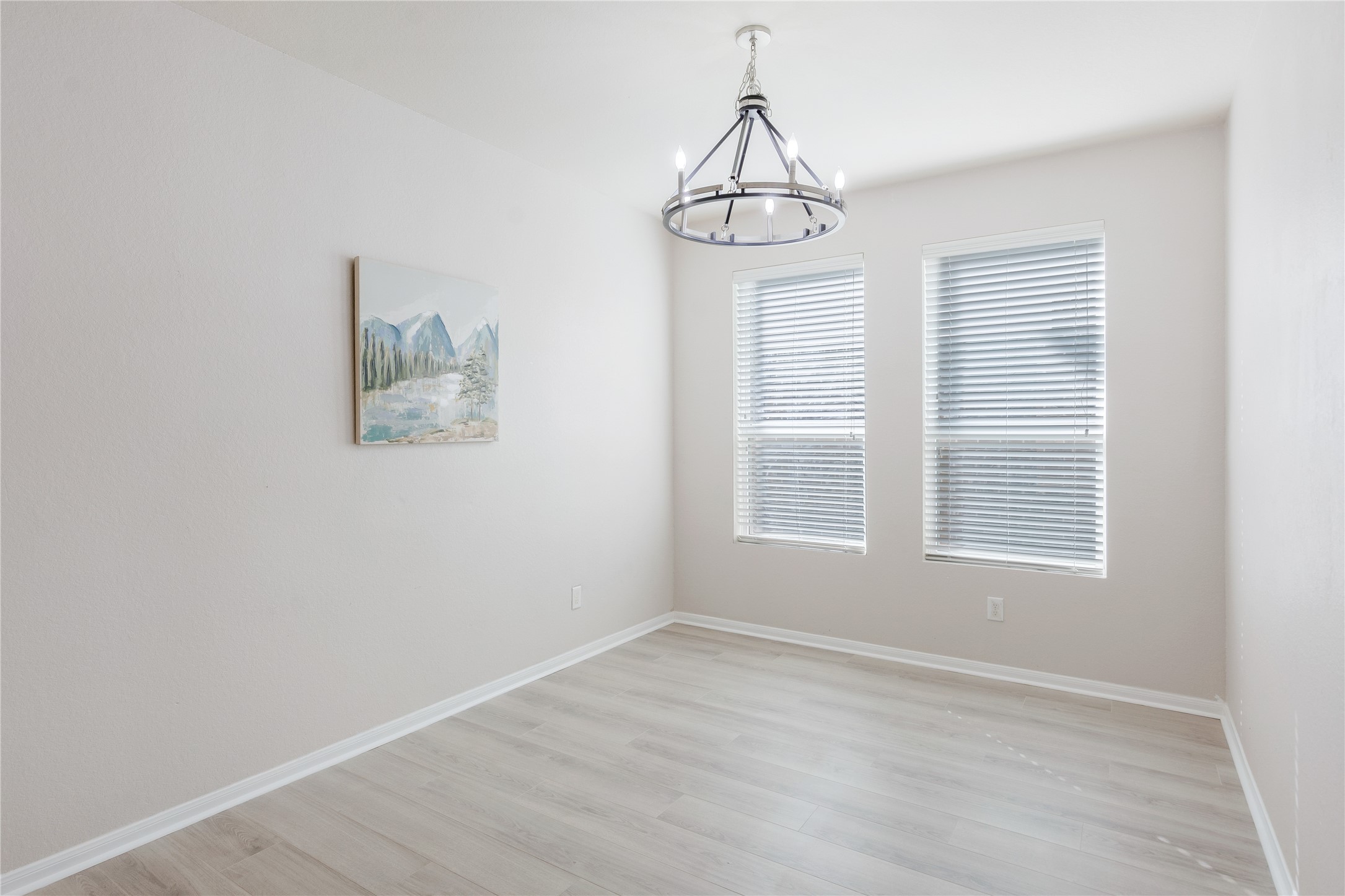 15007 Holland Grove Court Cypress, TX 77433 - Photo 9 of 28 a view of empty room with window and chandelier