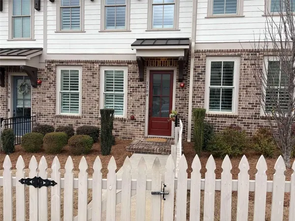 a front view of a house with a porch