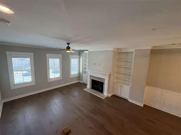 a living room with a fireplace