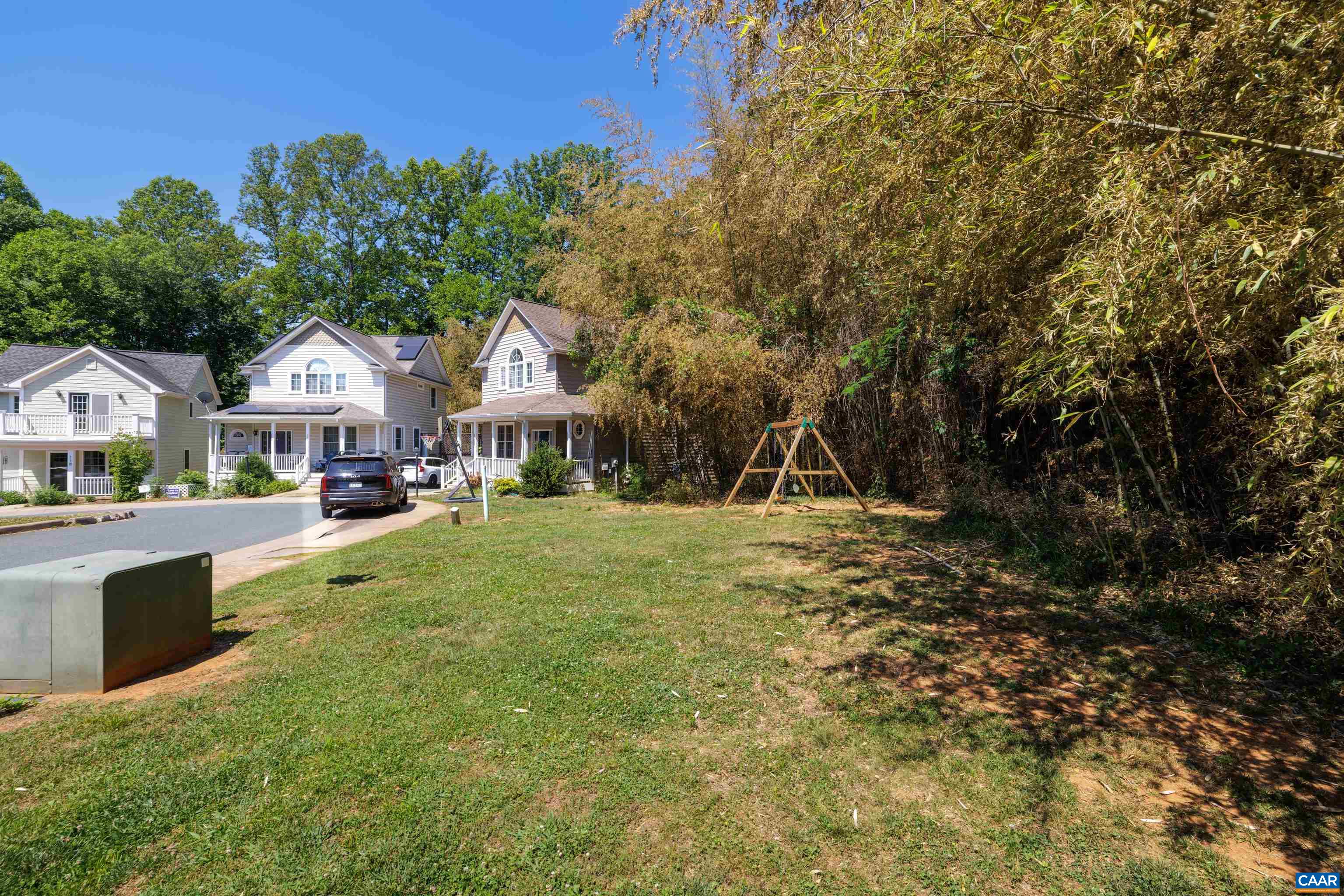 125 Roy's Place Charlottesville, VA 22902 - Photo 6 of 19 a front view of a house with a yard
