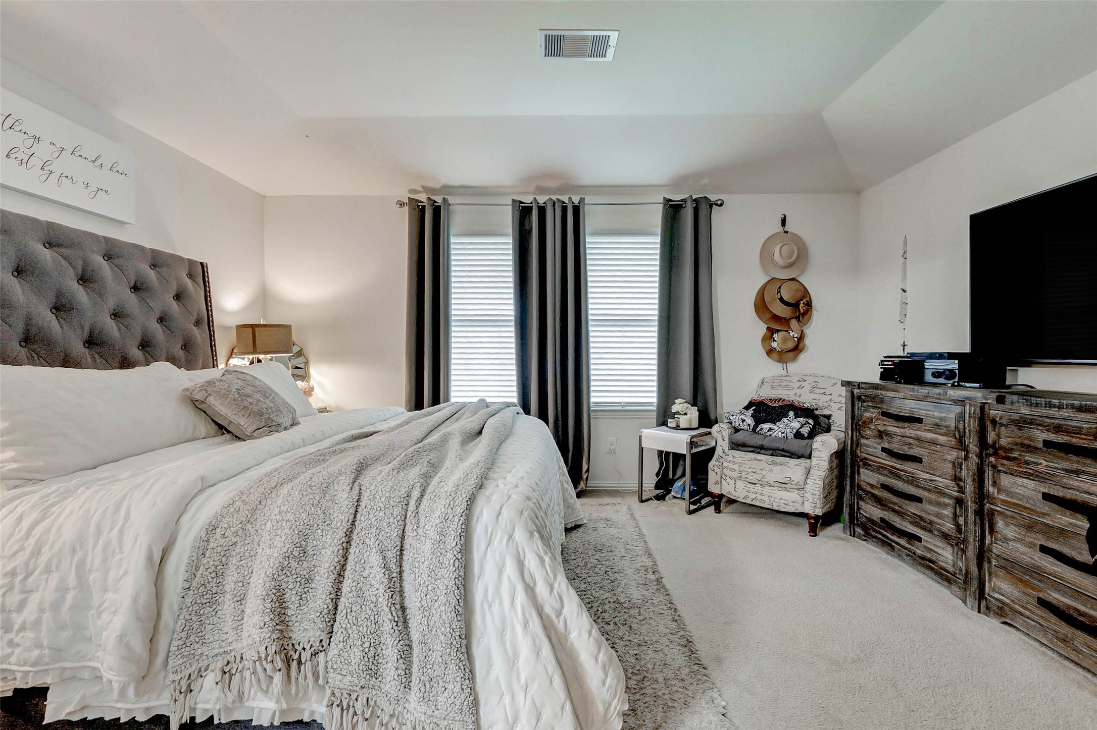 8319 Silent Deep Drive Rosenberg, TX 77469 - Photo 14 of 34 a bedroom with a bed and flat screen tv