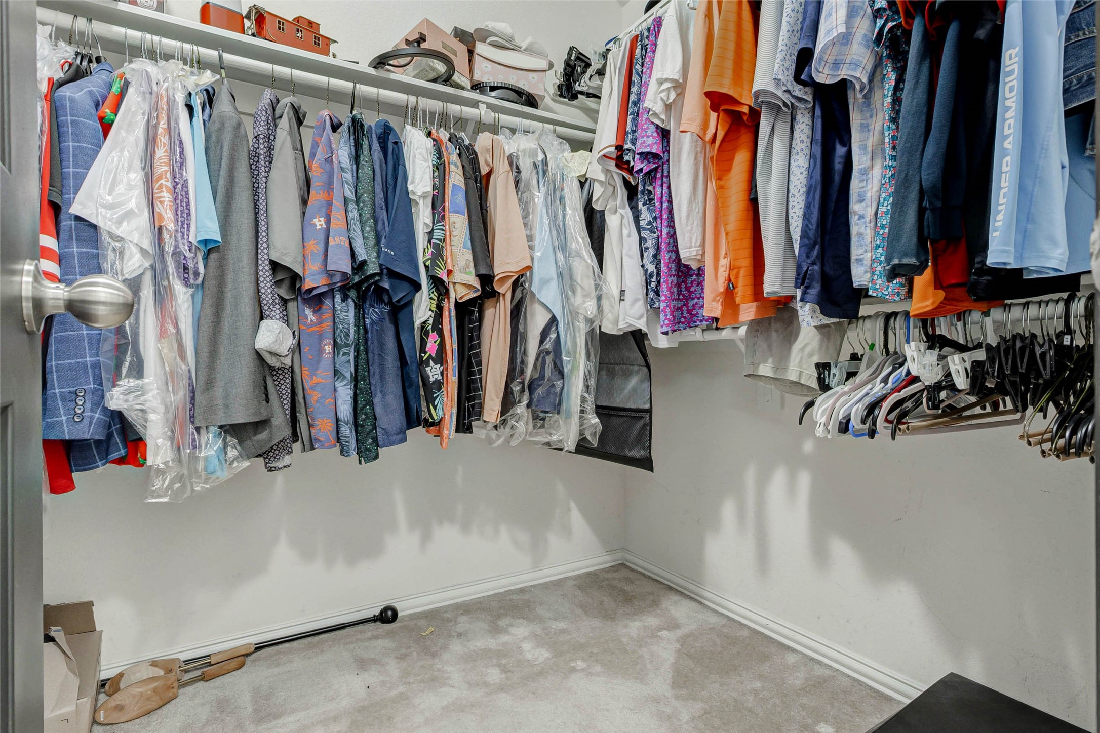 8319 Silent Deep Drive Rosenberg, TX 77469 - Photo 21 of 34 a view of walk in closet with clothes