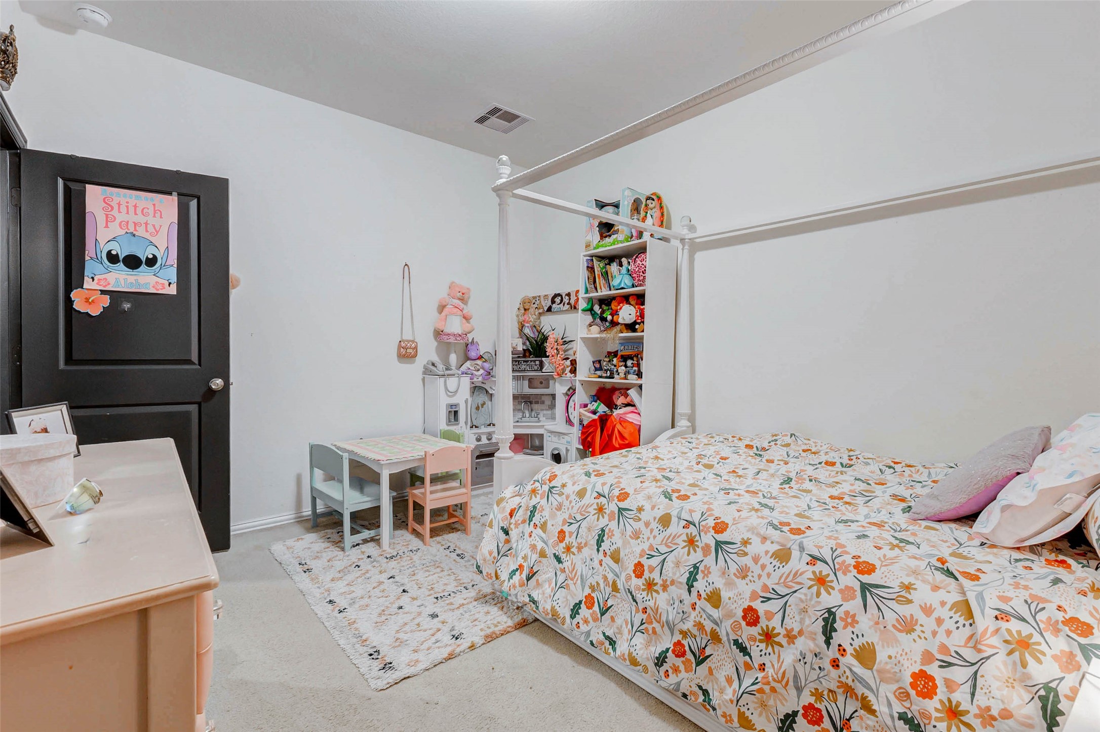 8319 Silent Deep Drive Rosenberg, TX 77469 - Photo 27 of 34 a bedroom with a bed and a cabinets