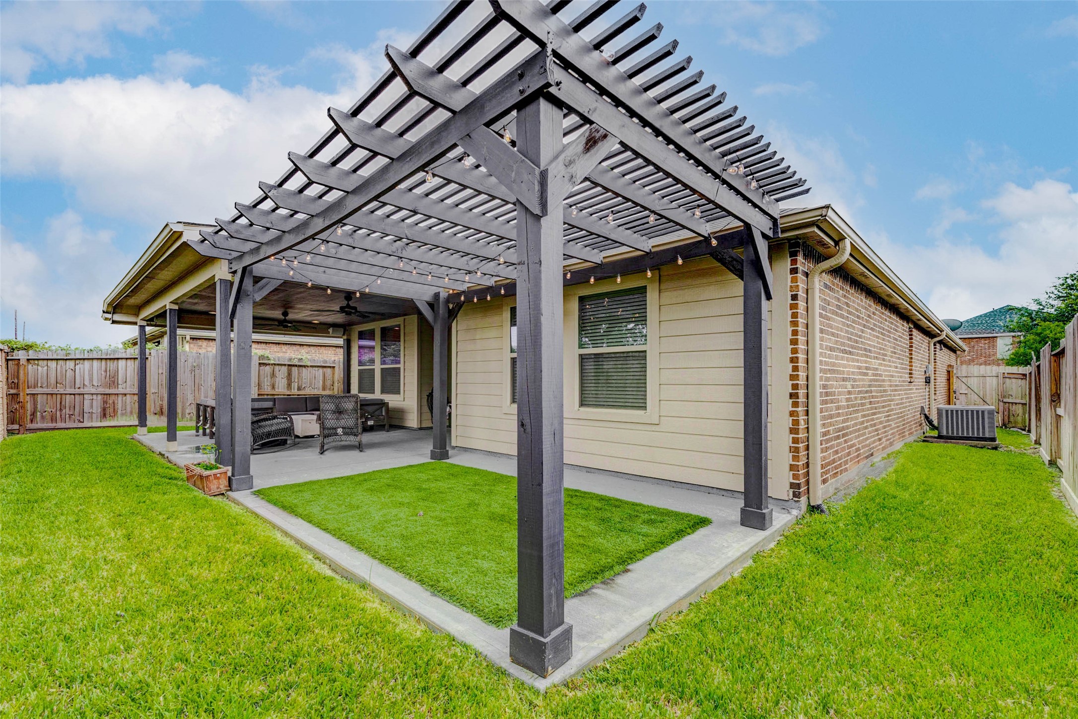 8319 Silent Deep Drive Rosenberg, TX 77469 - Photo 31 of 34 a view of a house with backyard and porch