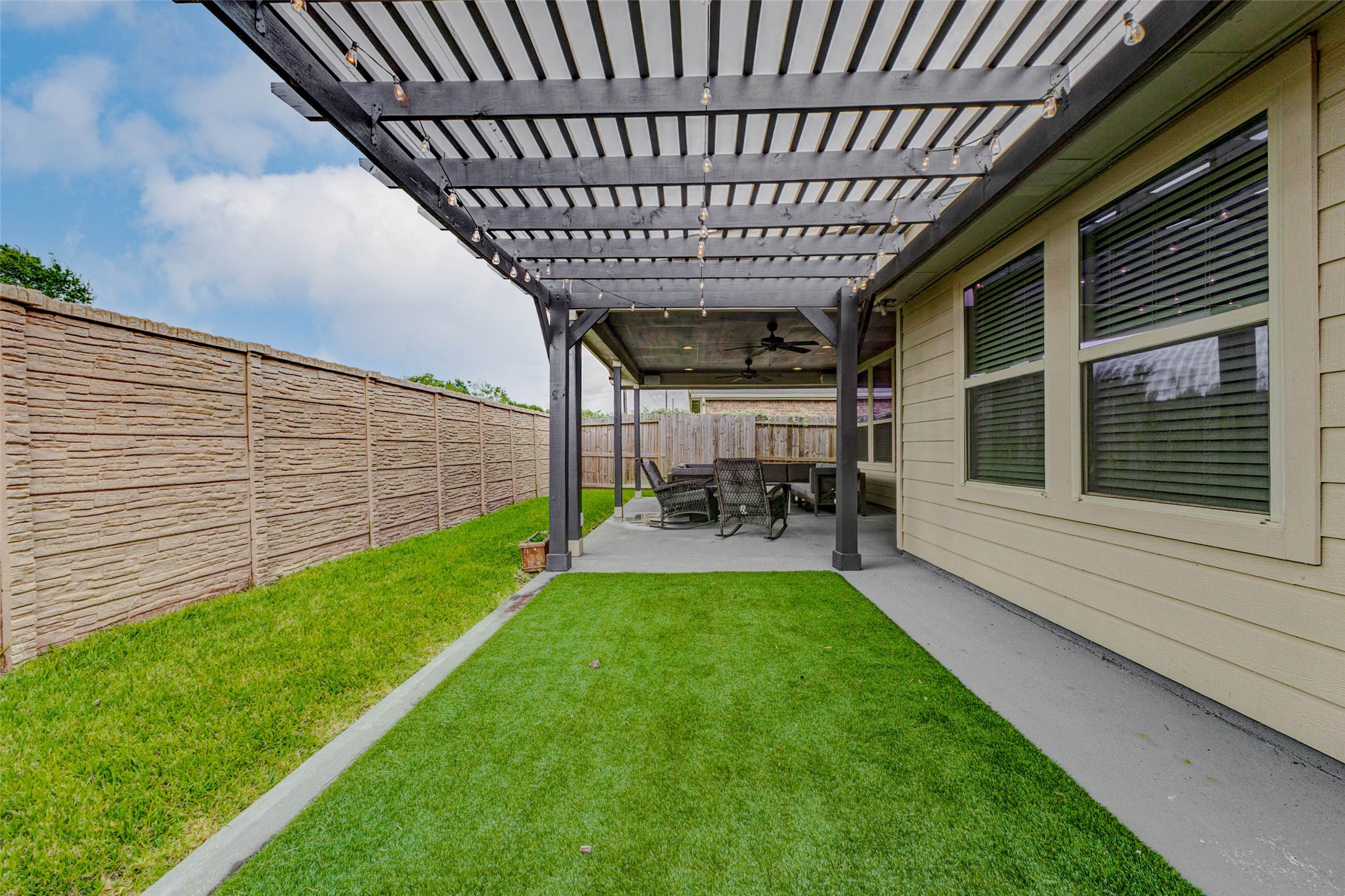 8319 Silent Deep Drive Rosenberg, TX 77469 - Photo 33 of 34 a view of yard with patio