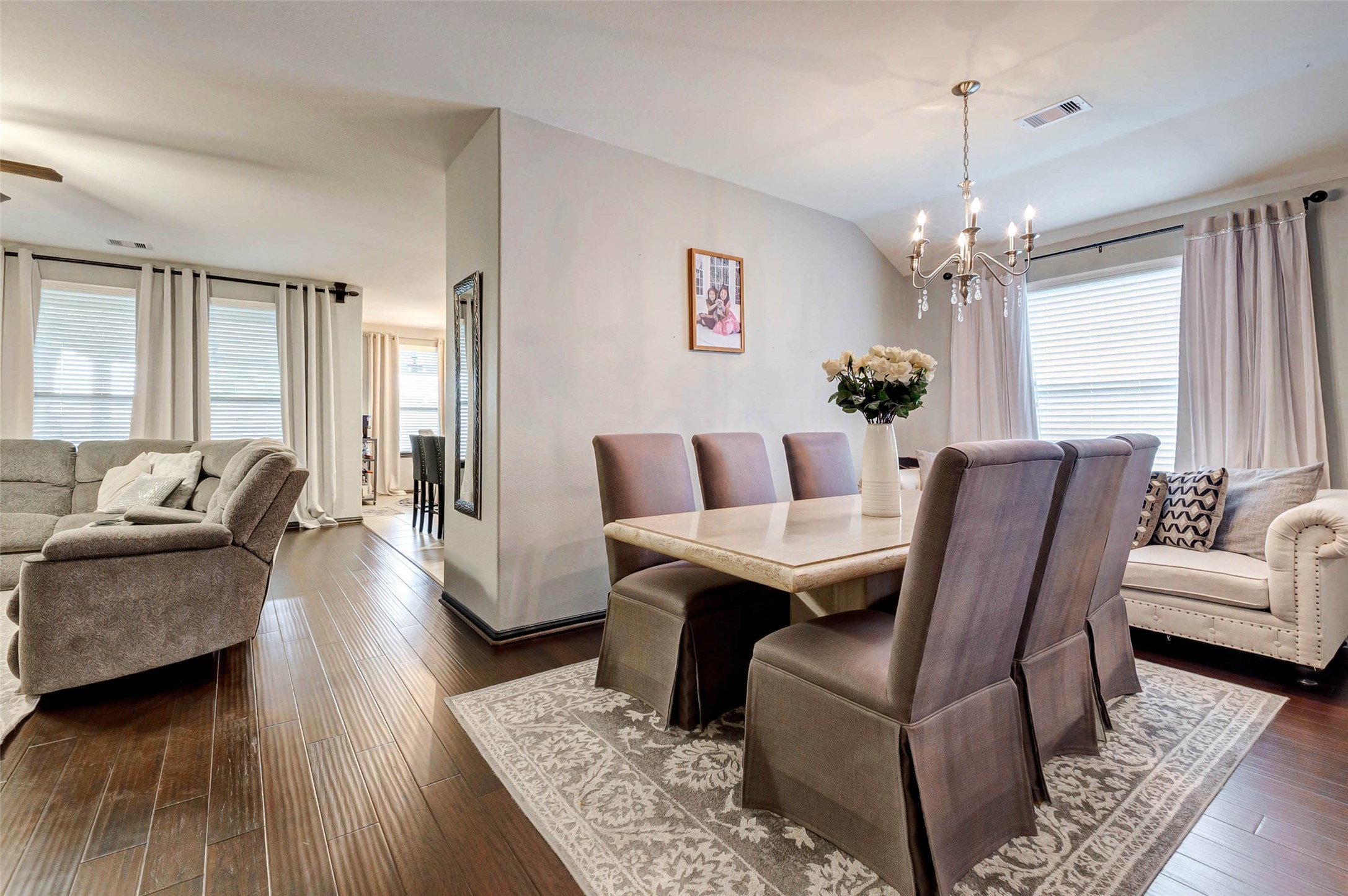 8319 Silent Deep Drive Rosenberg, TX 77469 - Photo 5 of 34 a living room with furniture and a chandelier