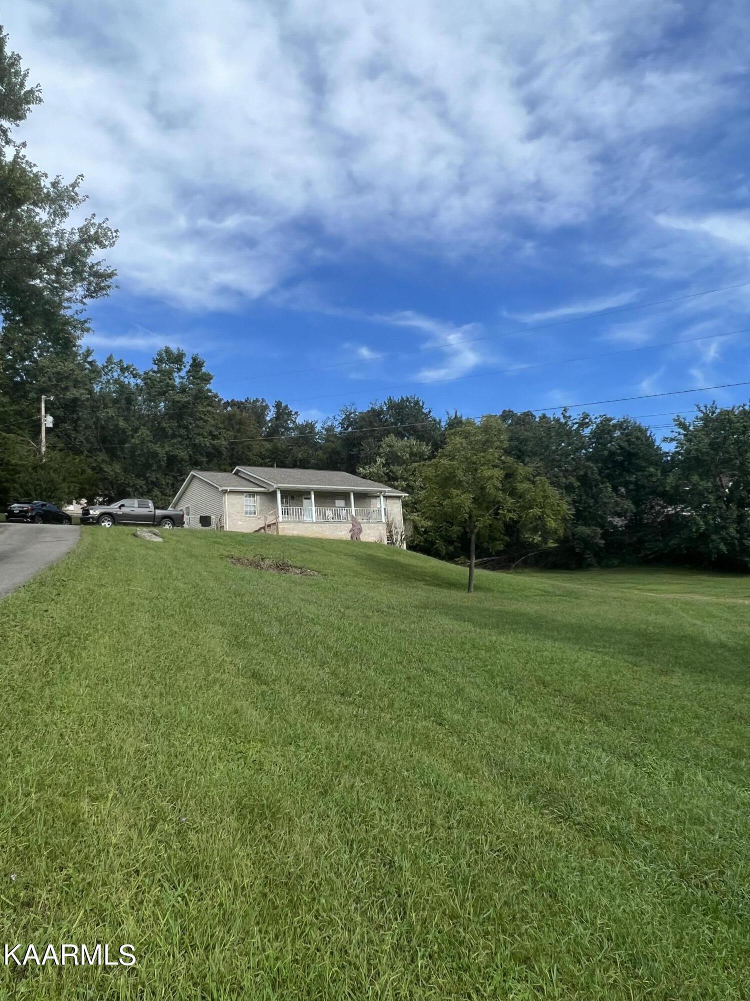 399 Sinking Springs Road Clinton, TN 37716 - Photo 1 of 2 2D06B73E-F0D1-4D0A-B5F2-5463AA57FD47